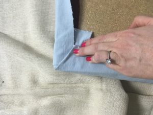 How to reupholster a chair: fold corners