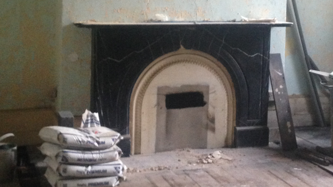 before fireplace